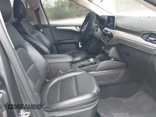 2020 Ford Escape SE Sport Hybrid with VIN 1FMCU0BZ7LUB13398, listed as a IAAI auction lot 41942498 with 118,604 mi miles and . Bid and sale history available at DreamBid. Image 5.