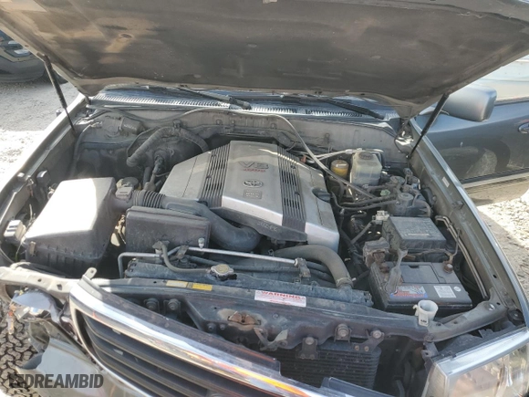 2000 Toyota Land Cruiser with VIN JT3HT05J1Y0096328, listed as a Copart auction lot 48390945 with 290,978 mi miles and Salvage Title. Bid and sale history available at carsss.com. Image 14.