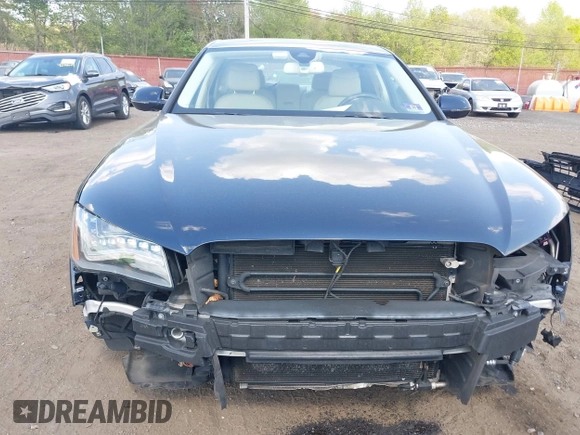 2014 Audi A8 3.0T z VIN WAURGAFD7EN005979, wystawiony jako IAAI lot #42169900 z przebiegiem 126 523 mil mil oraz . Historia ofert i sprzedaży dostępna na DreamBid. Obrazek 18.