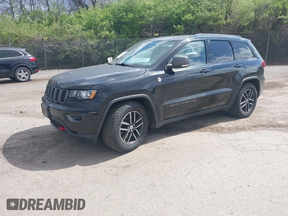 2017 Jeep Grand Cherokee Trailhawk with VIN 1C4RJFLG3HC674489, listed as a IAAI auction lot 42049006 with 91,892 mi miles and . Bid and sale history available at DreamBid. Image 2.