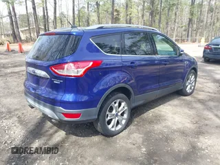 2014 Ford Escape Titanium with VIN 1FMCU9J94EUC38996, listed as a IAAI auction lot 41952267 with 211,375 mi miles. Bid and sale history available at carsss.com. Image 4.