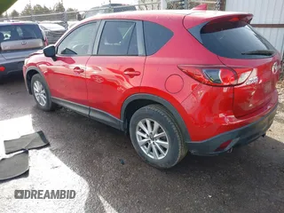 2016 Mazda CX-5 Sport with VIN JM3KE2BY3G0754391, listed as a IAAI auction lot 41719461 with 79,130 mi miles. Bid and sale history available at carsss.com. Image 3.
