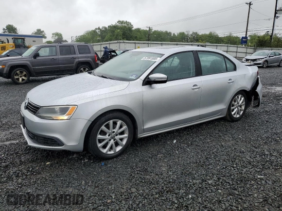 2011 Volkswagen Jetta SE with VIN 3VWDZ7AJ5BM319091, listed as a Copart auction lot 57991585 with 185,458 mi miles and Salvage title. Bid and sale history available at DreamBid. Image 1.