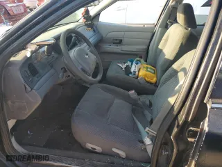 2004 Ford Police Interceptor Base w/3.27 Axle with VIN 2FAFP71WX4X149014, listed as a Copart auction lot 71305734 with 180,542 mi miles and Salvage Title. Bid and sale history available at carsss.com. Image 7.