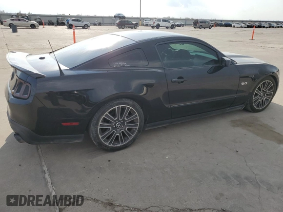 2012 Ford Mustang GT Premium with VIN 1ZVBP8CF0C5251771, listed as a Copart auction lot 50801515 with 104,833 mi miles and Salvage Title. Bid and sale history available at DreamBid. Image 3.