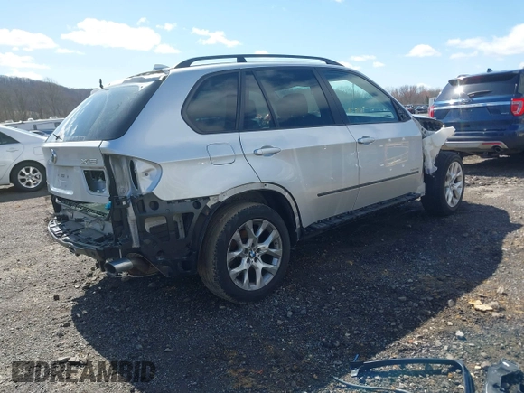 2012 BMW X5 35i с VIN 5UXZV4C56CL986384, выставлен на аукционе IAAI как лот 41986665 с пробегом Не указан миль и . История ставок и продаж доступна на DreamBid. Изображение 4.