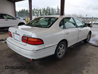 1998 Toyota Avalon XL with VIN 4T1BF18B5WU242038, listed as a IAAI auction lot 41577342 with 195,707 mi miles and . Bid and sale history available at DreamBid. Image 4.