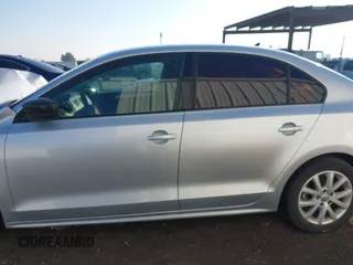 2015 Volkswagen Jetta SE z VIN 3VWD17AJ6FM257858, wystawiony jako IAAI lot #41007963 z przebiegiem 165 064 mil mil oraz . Historia ofert i sprzedaży dostępna na DreamBid. Obrazek 14.