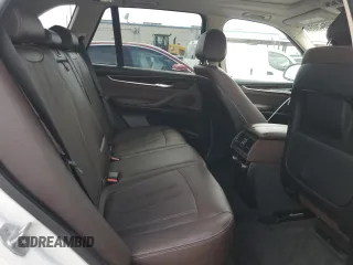 2015 BMW X5 xDrive35i z VIN 5UXKR0C58F0P03231, wystawiony jako Copart lot #60964305 z przebiegiem 71 419 mil mil oraz Szkoda całkowita • Salvage title. Historia ofert i sprzedaży dostępna na DreamBid. Obrazek 11.