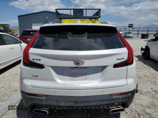 2023 Cadillac XT4 AWD Premium Luxury with VIN 1GYFZDR46PF130198, listed as a Copart auction lot 57763285 with 8,346 mi miles and Salvage title. Bid and sale history available at DreamBid. Image 6.