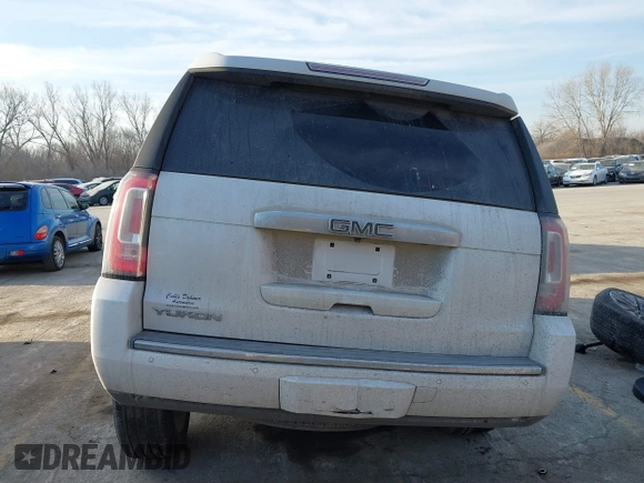 2017 GMC Yukon Denali with VIN 1GKS2CKJ4HR310822, listed as a IAAI auction lot 41666174 with 101,388 mi miles. Bid and sale history available at carsss.com. Image 16.