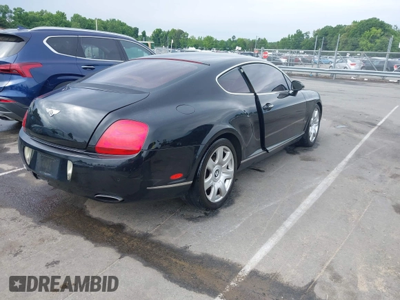 2005 Bentley Continental GT GT z VIN SCBCR63W55C025099, wystawiony jako IAAI lot #42208951 z przebiegiem 123 712 mil mil oraz . Historia ofert i sprzedaży dostępna na DreamBid. Obrazek 4.