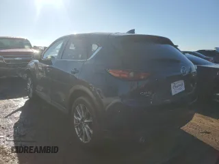 2021 Mazda CX-5 Grand Touring with VIN JM3KFBDM6M1499524, listed as a Copart auction lot 46604635 with 47,799 mi miles and Salvage Title. Bid and sale history available at carsss.com. Image 2.