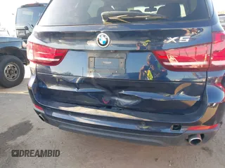 2015 BMW X5 xDrive35i with VIN 5UXKR0C53F0K62348, listed as a IAAI auction lot 41969164 with 122,612 mi miles. Bid and sale history available at carsss.com. Image 6.