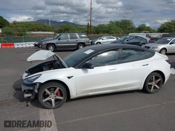 2019 Tesla Model 3 Mid Range with VIN 5YJ3E1EA6KF396946, listed as a IAAI auction lot 41123058 with 69,013 mi miles and . Bid and sale history available at carsss.com. Image 6.