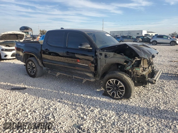 2023 Toyota Tacoma 4WD SR with VIN 3TYCZ5AN0PT110522, listed as a Copart auction lot 82789424 with 45,115 mi miles and Salvage Title. Bid and sale history available at carsss.com. Image 4.