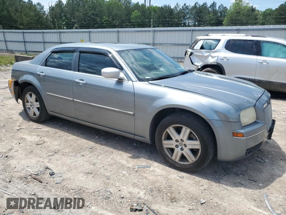 2006 Chrysler 300 Touring z VIN 2C3KK53G36H382476, wystawiony jako Copart lot #56132735 z przebiegiem 164 426 mil mil oraz Szkoda całkowita • Salvage title. Historia ofert i sprzedaży dostępna na DreamBid. Obrazek 4.