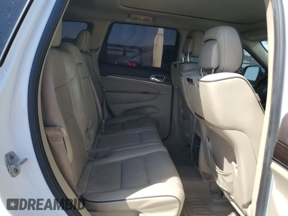 2015 Jeep Grand Cherokee Overland with VIN 1C4RJFCM4FC618516, listed as a Copart auction lot 58671455 with 221,550 mi miles and Clean title. Bid and sale history available at DreamBid. Image 11.