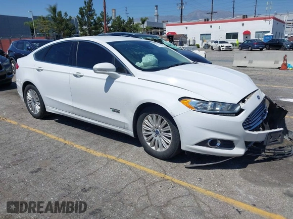 2016 Ford Fusion Energi SE Luxury with VIN 3FA6P0PU7GR206589, listed as a IAAI auction lot 42002565 with 215,789 mi miles. Bid and sale history available at carsss.com. Image 1.