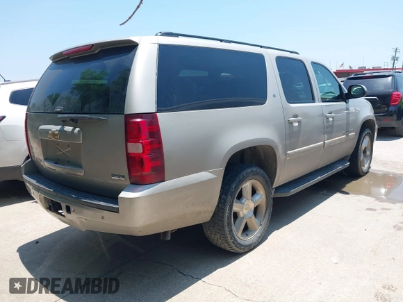 2007 Chevrolet Suburban LT with VIN 1GNFK16327J350303, listed as a IAAI auction lot 42413524 with 215,353 mi miles and . Bid and sale history available at DreamBid. Image 4.