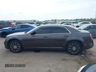 2014 Chrysler 300 S with VIN 2C3CCAGG5EH201509, listed as a IAAI auction lot 42292680 with 162,674 mi miles and . Bid and sale history available at DreamBid. Image 14.