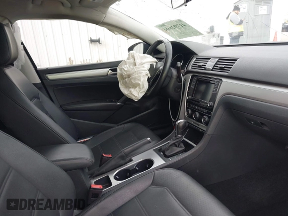 2019 Volkswagen Passat 2.0T Wolfsburg Edition with VIN 1VWLA7A34KC012887, listed as a IAAI auction lot 41792604 with 70,237 mi miles. Bid and sale history available at carsss.com. Image 5.