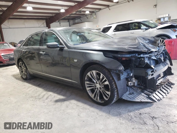 2017 Cadillac CT6 Platinum AWD with VIN 1G6KN5R67HU183399, listed as a Copart auction lot 42323205 with 62,782 mi miles and Salvage title. Bid and sale history available at DreamBid. Image 4.