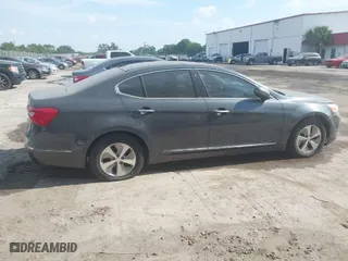 2015 Kia Cadenza Premium with VIN KNALN4D77F5177795, listed as a IAAI auction lot 42061727 with 112,063 mi miles. Bid and sale history available at carsss.com. Image 13.