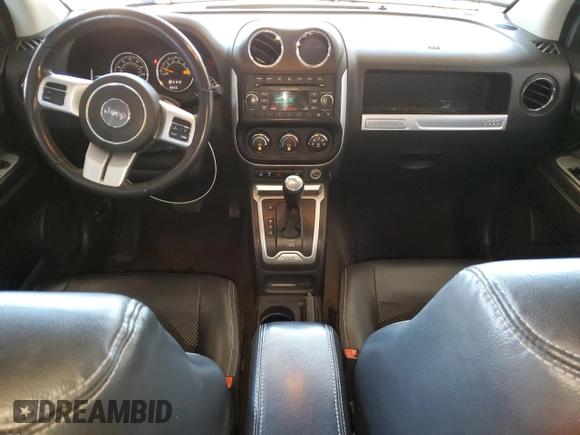 2016 Jeep Compass Latitude z VIN 1C4NJCEAXGD633548, wystawiony jako Copart lot #59866875 z przebiegiem 193 695 mil mil oraz Szkoda całkowita • Salvage title. Historia ofert i sprzedaży dostępna na DreamBid. Obrazek 8.