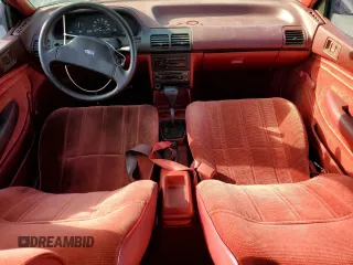 1991 Ford Escort z VIN 1FAPP14JXMW279906, wystawiony jako Copart lot #71882954 z przebiegiem 190 721 mil mil oraz Tytuł czysty. Historia ofert i sprzedaży dostępna na DreamBid. Obrazek 8.