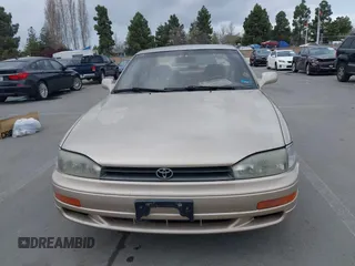 1994 Toyota Camry LE with VIN JT2SK12E0R0269820, listed as a IAAI auction lot 41908360 with 184,739 mi miles. Bid and sale history available at carsss.com. Image 6.