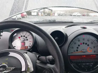 2014 MINI Cooper Countryman S with VIN WMWZC5C56EWP40320, listed as a IAAI auction lot 41792374 with 103,894 mi miles. Bid and sale history available at carsss.com. Image 7.