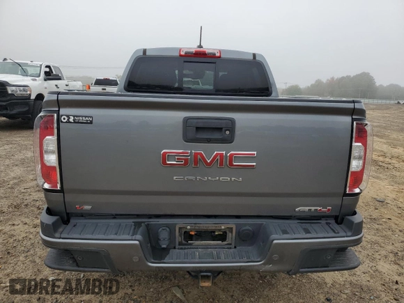 2021 GMC Canyon 4WD AT4 w/Cloth with VIN 1GTG6FEN8M1115918, listed as a Copart auction lot 80592964 with 59,888 mi miles and Salvage Title. Bid and sale history available at carsss.com. Image 6.