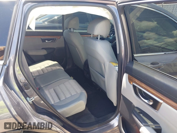 2019 Honda CR-V EX z VIN 7FARW1H58KE027824, wystawiony jako IAAI lot #42381140 z przebiegiem 96 241 mil mil oraz . Historia ofert i sprzedaży dostępna na DreamBid. Obrazek 8.