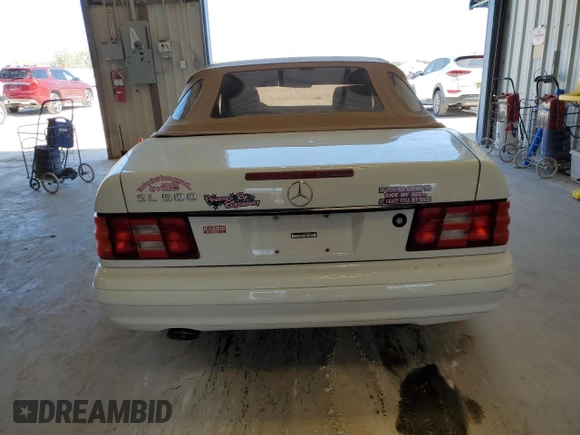 1999 Mercedes-Benz SL-Class with VIN WDBFA68F2XF179134, listed as a Copart auction lot 67335014 with 68,406 mi miles and Clean Title. Bid and sale history available at carsss.com. Image 6.