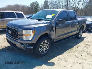2021 Ford F-150 XL with VIN 1FTFW1E57MFB45980, listed as a IAAI auction lot 41775857 with 103,963 mi miles. Bid and sale history available at carsss.com. Image 17.