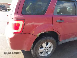 2008 Ford Escape XLT with VIN 1FMCU93108KC15674, listed as a IAAI auction lot 42049019 with 180,077 mi miles. Bid and sale history available at carsss.com. Image 6.