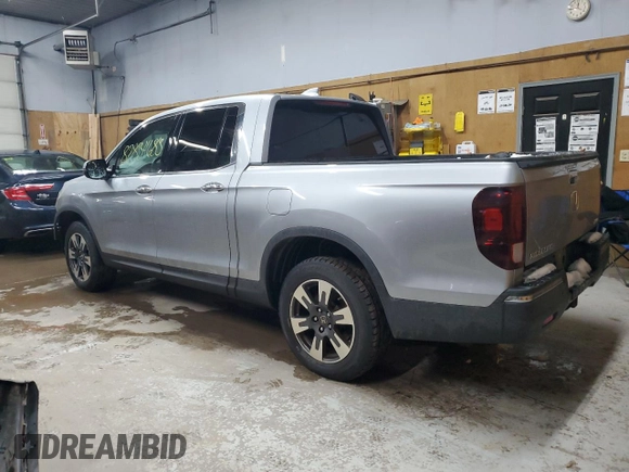 2017 Honda Ridgeline RTL-E with VIN 5FPYK3F71HB030020, listed as a Copart auction lot 82834683 with 102,111 mi miles and Salvage title. Bid and sale history available at DreamBid. Image 2.