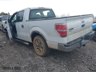 2013 Ford F-150 XL with VIN 1FTFW1CF2DFB40942, listed as a IAAI auction lot 40884111 with 266,063 mi miles. Bid and sale history available at carsss.com. Image 3.