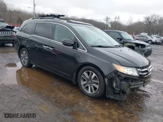 2016 Honda Odyssey Touring Elite with VIN 5FNRL5H90GB090566, listed as a IAAI auction lot 41564917 with 73,433 mi miles. Bid and sale history available at carsss.com. Image 1.