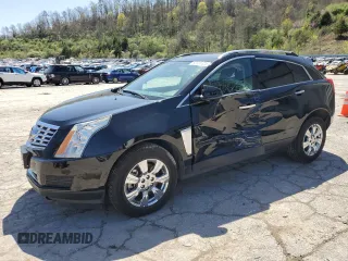 2014 Cadillac SRX Luxury Collection z VIN 3GYFNEE32ES647165, wystawiony jako Copart lot #52331335 z przebiegiem 27 277 mil mil oraz Szkody całkowita. Historia ofert i sprzedaży dostępna na DreamBid. Obrazek 1.