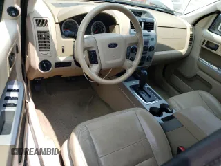 2012 Ford Escape XLT z VIN 1FMCU9DG3CKA41742, wystawiony jako Copart lot #60092135 z przebiegiem 175 330 mil mil oraz Szkoda całkowita • Salvage title. Historia ofert i sprzedaży dostępna na DreamBid. Obrazek 8.