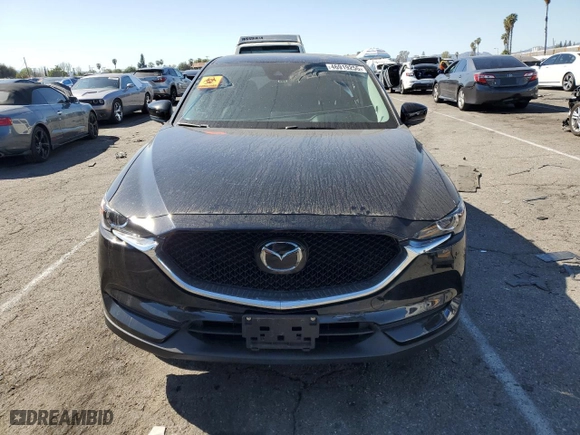 2019 Mazda CX-5 Touring with VIN JM3KFBCM8K1506780, listed as a Copart auction lot 46919255 with NaN miles and Salvage Title. Bid and sale history available at carsss.com. Image 5.