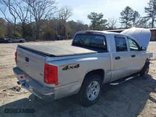 2005 Dodge Dakota SLT with VIN 1D7HW48N35S219514, listed as a IAAI auction lot 41744500 with 132,000 mi miles. Bid and sale history available at carsss.com. Image 4.
