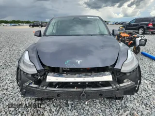 2024 Tesla Model Y Long Range with VIN 7SAYGDEE9RA255688, listed as a Copart auction lot 58918665 with 21,302 mi miles and Salvage title. Bid and sale history available at DreamBid. Image 5.