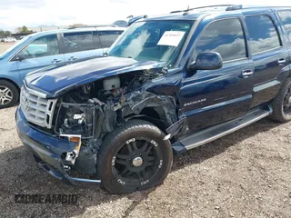2004 Cadillac Escalade z VIN 1GYEC63T34R273497, wystawiony jako IAAI lot #41719537 z przebiegiem 256 975 mil mil oraz . Historia ofert i sprzedaży dostępna na DreamBid. Obrazek 6.