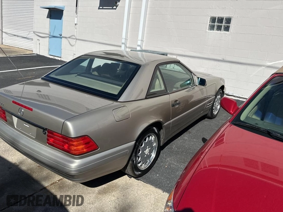 1998 Mercedes-Benz SL-Class with VIN WDBFA67F4WF157541, listed as a Copart auction lot 82624554 with 102,469 mi miles and Clean Title. Bid and sale history available at carsss.com. Image 4.