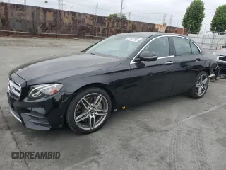 2019 Mercedes-Benz E 300 with VIN WDDZF4JB9KA605893, listed as a Copart auction lot 61765285 with 50,433 mi miles and Salvage title. Bid and sale history available at DreamBid. Image 1.