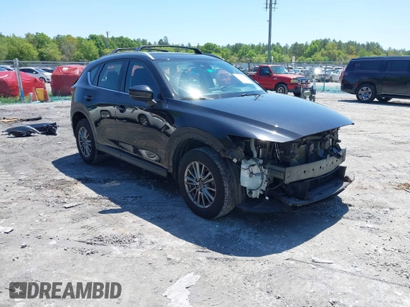 2018 Mazda CX-5 Sport with VIN JM3KFBBM4J0417018, listed as a IAAI auction lot 41984290 with 104,113 mi miles. Bid and sale history available at carsss.com. Image 1.