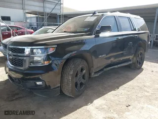 2019 Chevrolet Tahoe LT with VIN 1GNSCBKC0KR328639, listed as a IAAI auction lot 41740284 with 111,734 mi miles. Bid and sale history available at carsss.com. Image 2.